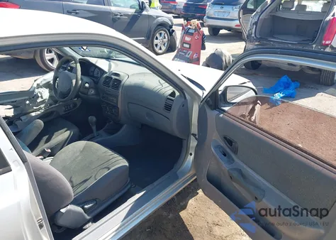 2002 Hyundai Accent Gs из США, поврежденный, VIN KMHCG35C32U179011